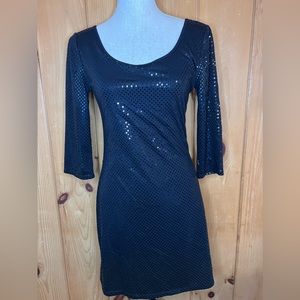 Black cocktail dress with sleeves